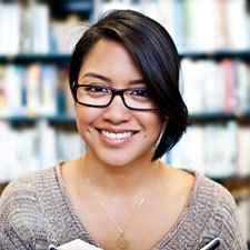 A young woman with glasses